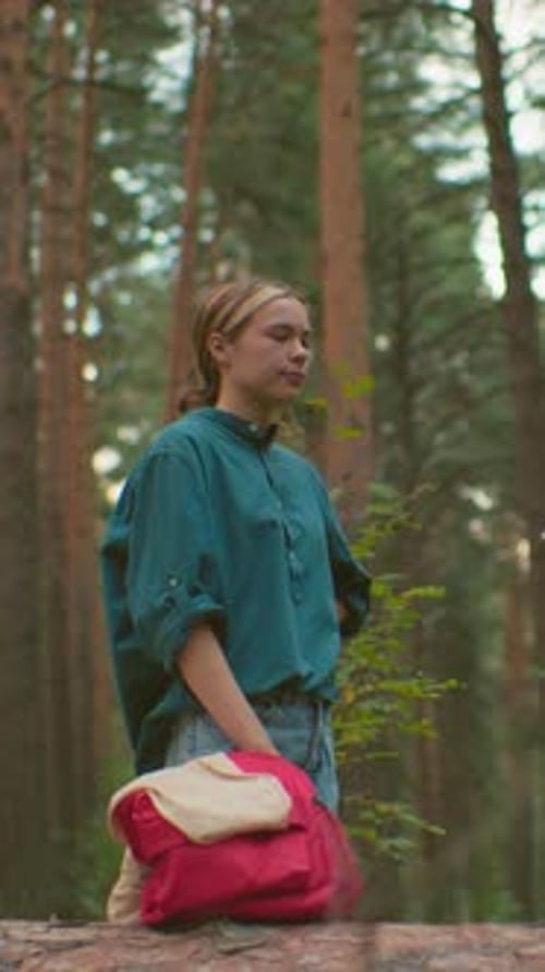 Friends Share Warm Drink in Peaceful Forest Setting