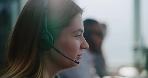 Close Up of Young Technical Customer Support Specialist in Headset Providing Online Help