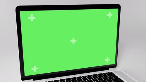 Green Screen Display Laptop Opens and Zoom In on a White Background