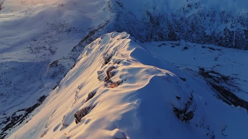 Winter Mountains Snowcapped Peaks Golden Hour Sunset or Sunrise Stunning Natural Scenery