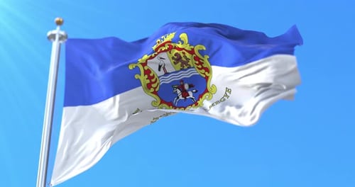Realistic Jász-Nagykun-Szolnok County Flag Waving in Blue Sky