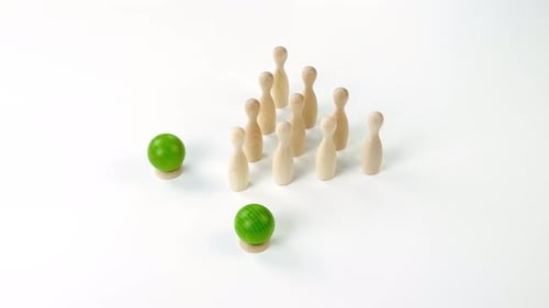 Wooden Bowling Pins and Balls on White Background