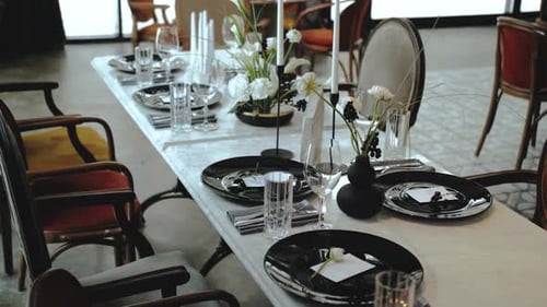 Elegant Wedding Table Setting with Vintage Chairs