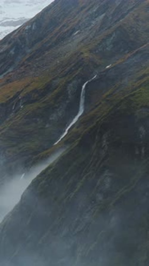 Nepal Waterfall in Rugged Mountains Scenery, Vertical Video for Social Media Instagram Reels and Tik