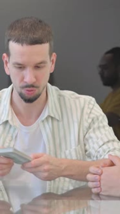 Young Man Giving Money while Doing Payment, vertical video