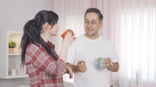 Cheerful Friends Talking and Laughing Indoors