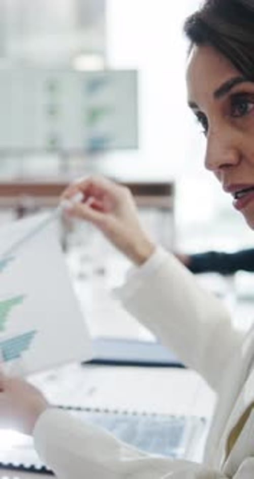 Talking, woman and paperwork with graphs, boardroom and risk assessment with info or collaboration