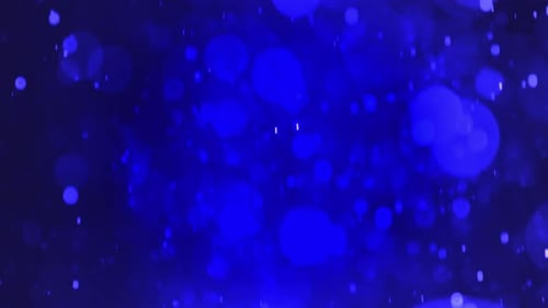 Blaue Partikel, die im Weltraum schweben
