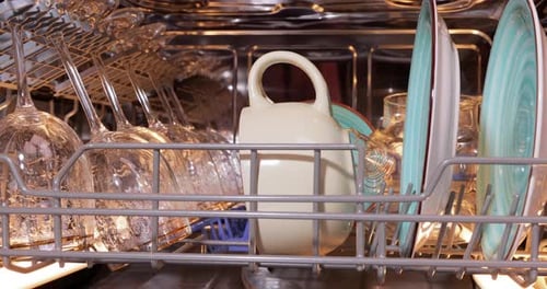 Dishwasher Interior Close Up with Dishes and Glassware