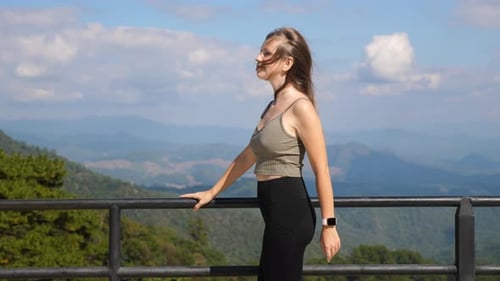 Woman Enjoy View on Mountains From Viewpoint