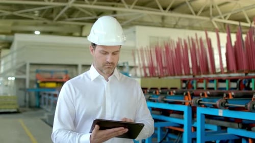 Industrial Worker Engineer Man with Tablet Factory Heavy Machine Metal Manufacturing Equipment