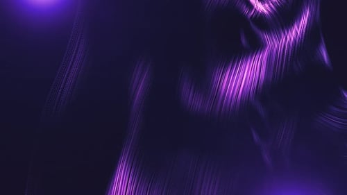 Purple fiber optic moving light particles from center on black background.