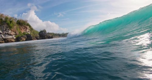Blue Wave in Ocean Breaking Wave with Sun Light