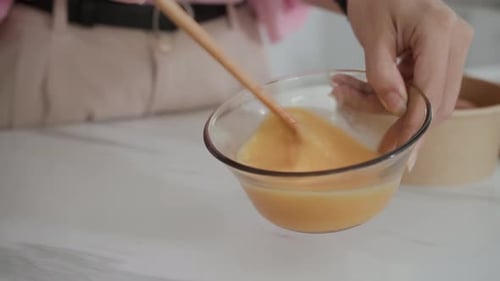 Close Up of Mixing Ingredients in a Bowl