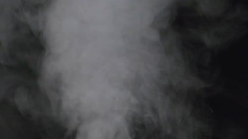 Ethereal White Smoke Swirls on Black Background