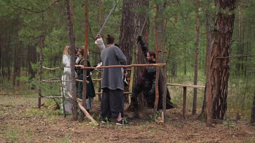 Group of People Sword Ceremony in Forest