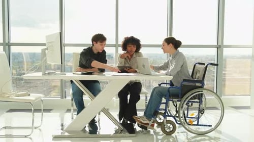 Business Team Meeting at Modern Office Table