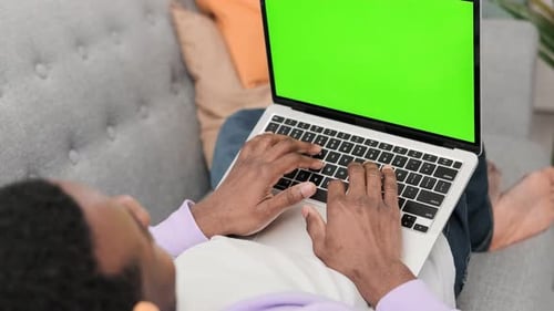 Black Man Using Laptop Notebook Viewing Green Screen Press Keyboard Browsing Chroma Key African