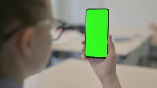 Businesswoman Using Smartphone with Chroma Key Green Screen