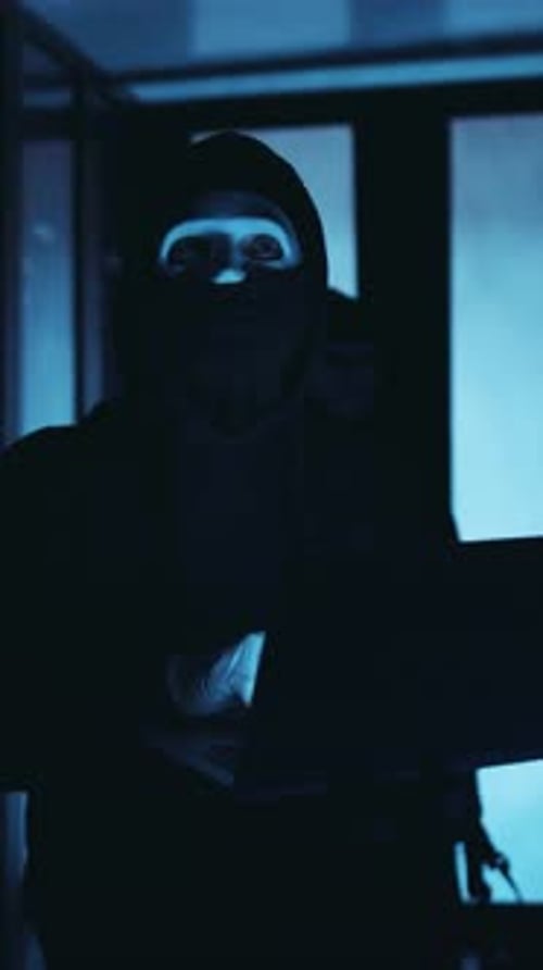 A Mysterious Hacker Operates in a HighTech Environment Full of Advanced Systems