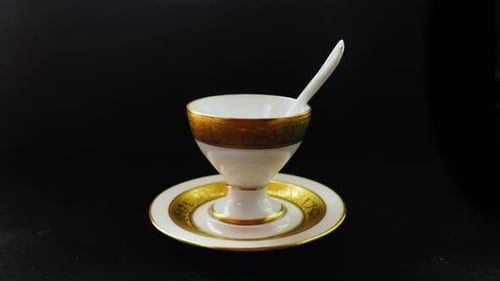 White Glove Service Presenting Gold Tableware in Cinematic Luxury Hospitality Scene