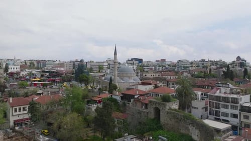 Aerial Ascending Footage of Historic Monuments in Old Town District Tekeli Mehmet Pasa Mosque with