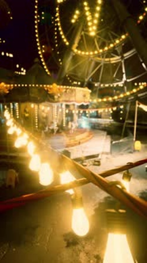 Colorful Carnival Ride Illuminated With Lights