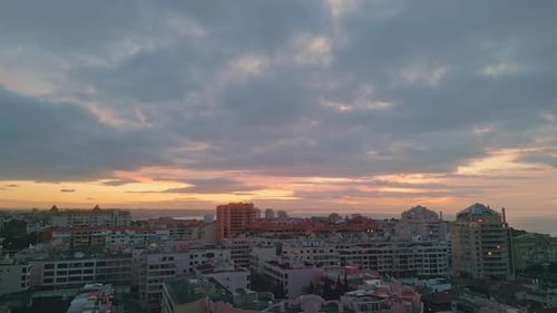 Cloudy Coastal City Sunset Drone View Town at Ocean Coast Evening Sun Light