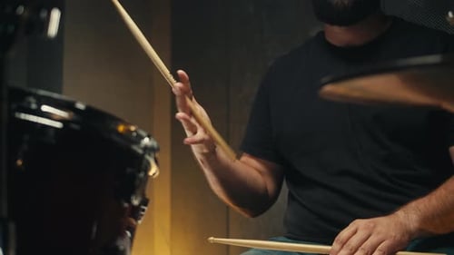 Expressive Drummer Young Man Professionally Playing on Dums in Studio Room Closeup Rock Metall Music