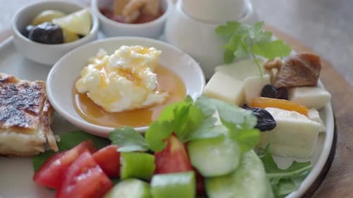 Butter Cream and Honey i Served with Salad Olive and Cheese
