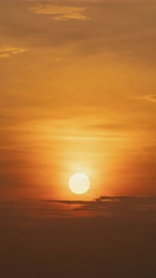 Sun Rises Through Clouds Time Lapse