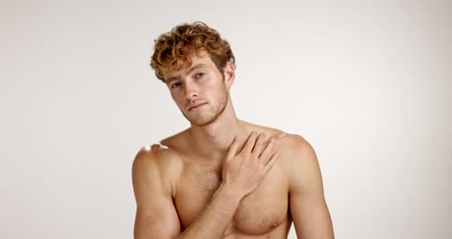 Happy man, face and skincare with beard for grooming or hygiene in studio on a white background