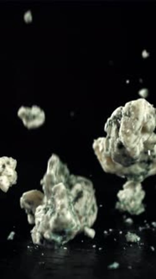 Super Slow Motion Blue Cheese on Black Background Filmed on a Highspeed Camera at 1000 Fps