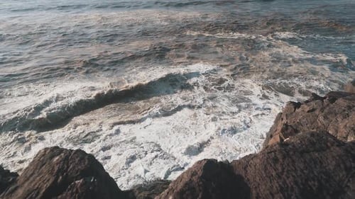 Waves crashing on cliffs of the brazilian atlantic ocean in slow motion