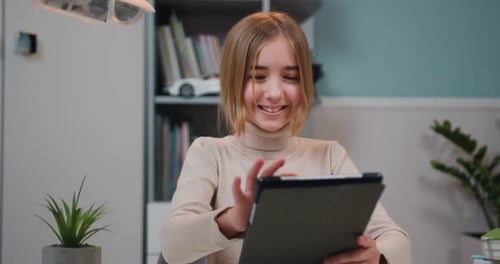 Portrait of Good-Looking 10s Year School Girl Use Tablet Device, Learning Online at Home Classroom,
