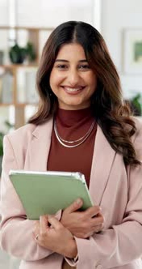 Creative, tablet and face of woman in office for research, digital magazine and journalism career