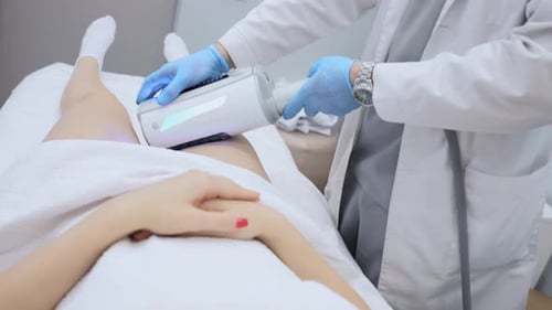 Doctor Administers Modern Medical Treatment in Clinic