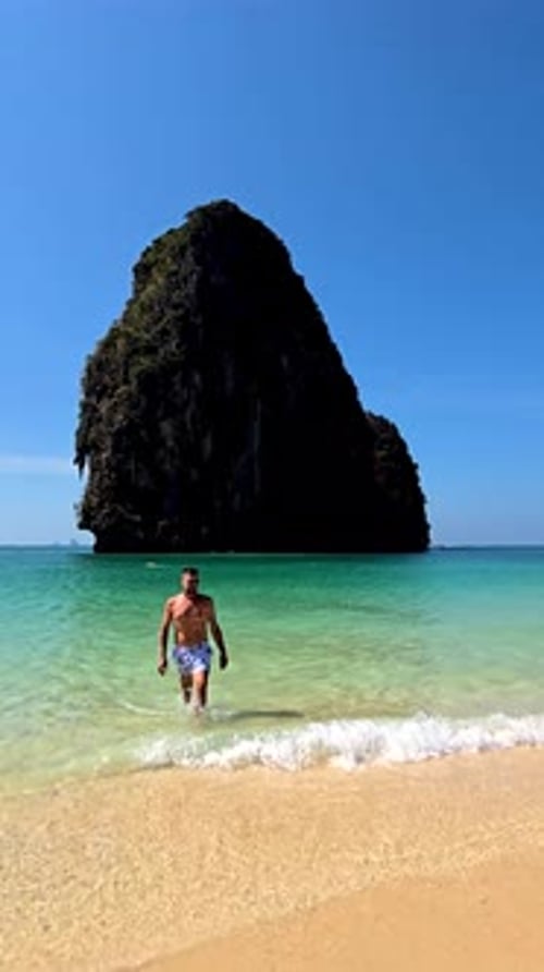 Breathtaking Beach Day in Krabi Thailand with Stunning Rock Formations and Clear Waters