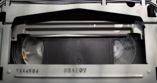 Close up shot of a vintage VHS tape recorder - cassette eject
