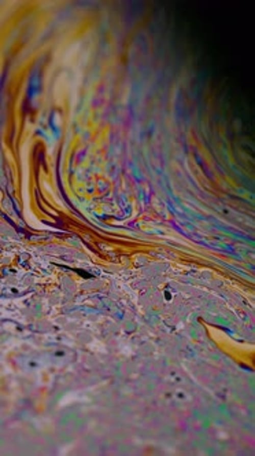 Vertical Iridescent Fluid Liquid Droplets Flow Ink