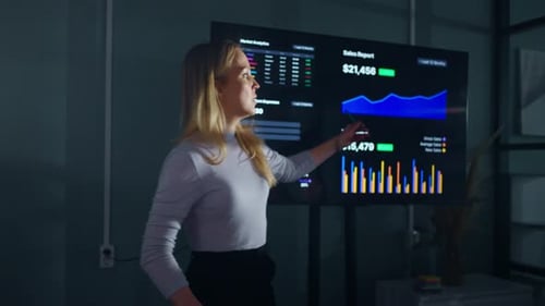 Business Presentation with Digital Charts in Modern Office