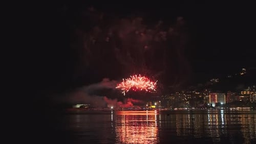 Fireworks with Colorful Lights Over Sea