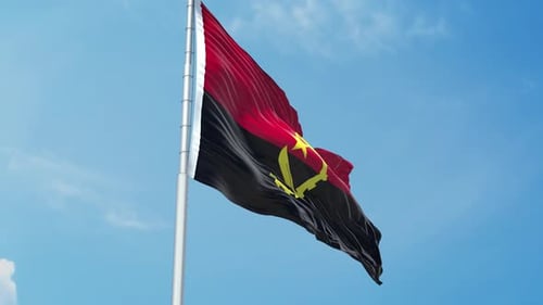 Angola National Flag Waving in Clear Blue Sky