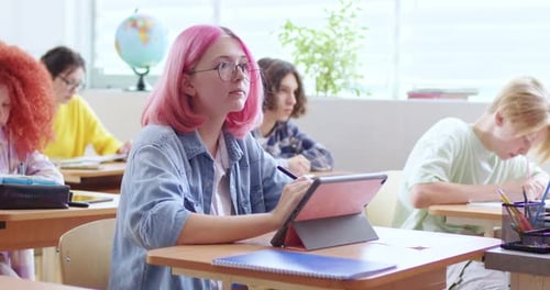 Students Studying in a Bright Classroom