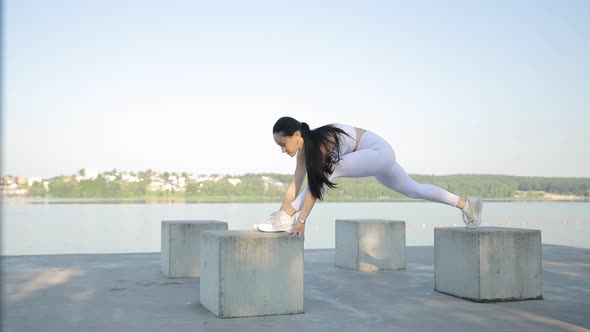 Sporty Young Woman in Sportswear Doing Stretching Exercises Straining ...