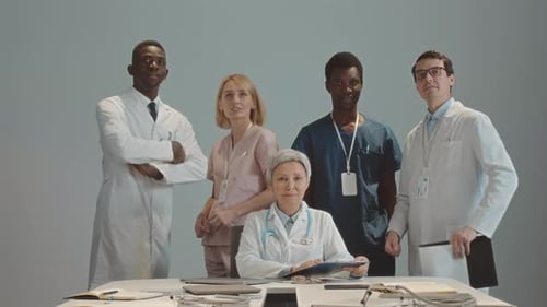 Group of Medical Professionals Posing in an Office