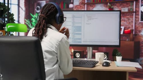 Woman Happy After Finishing Work on Algorithm Scripts