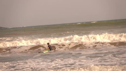 Teenage Boy Surfing On Board In Sea, Super Slow Motion 240fps