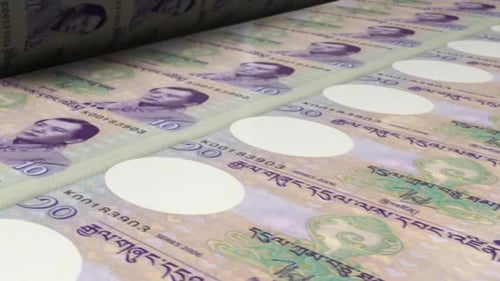 10 billets de ngultrum bhoutanais sur machine à imprimer