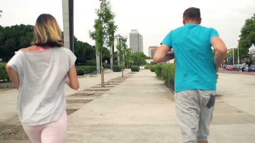 Young Couple Jogging City Slow Motion